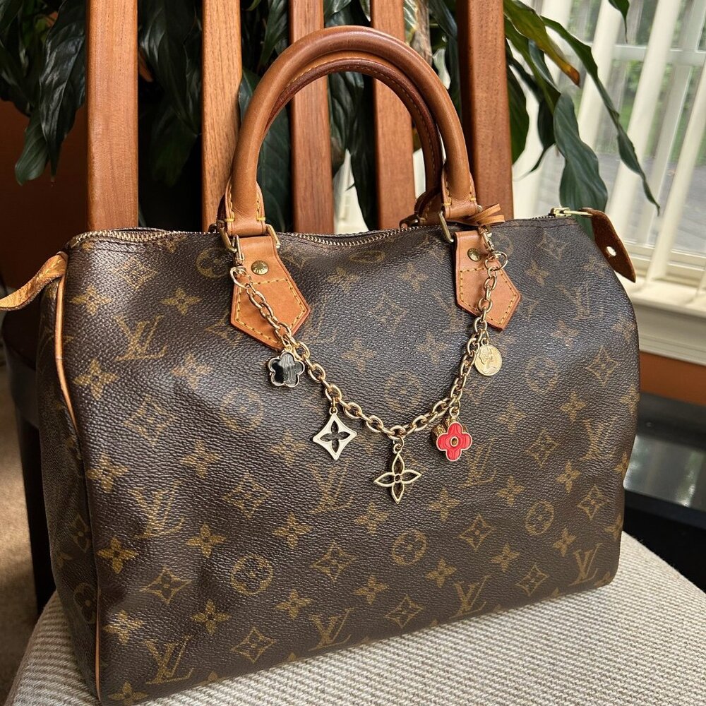New CLOVER Bag Charm Red Black Gold ꕤ